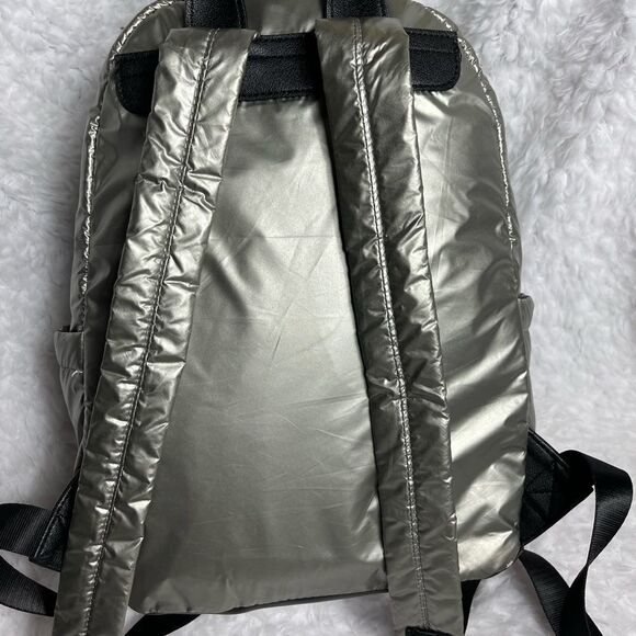 Juicy Couture Metallic quilted silver Backpack with black trim. - Picture 2 of 16
